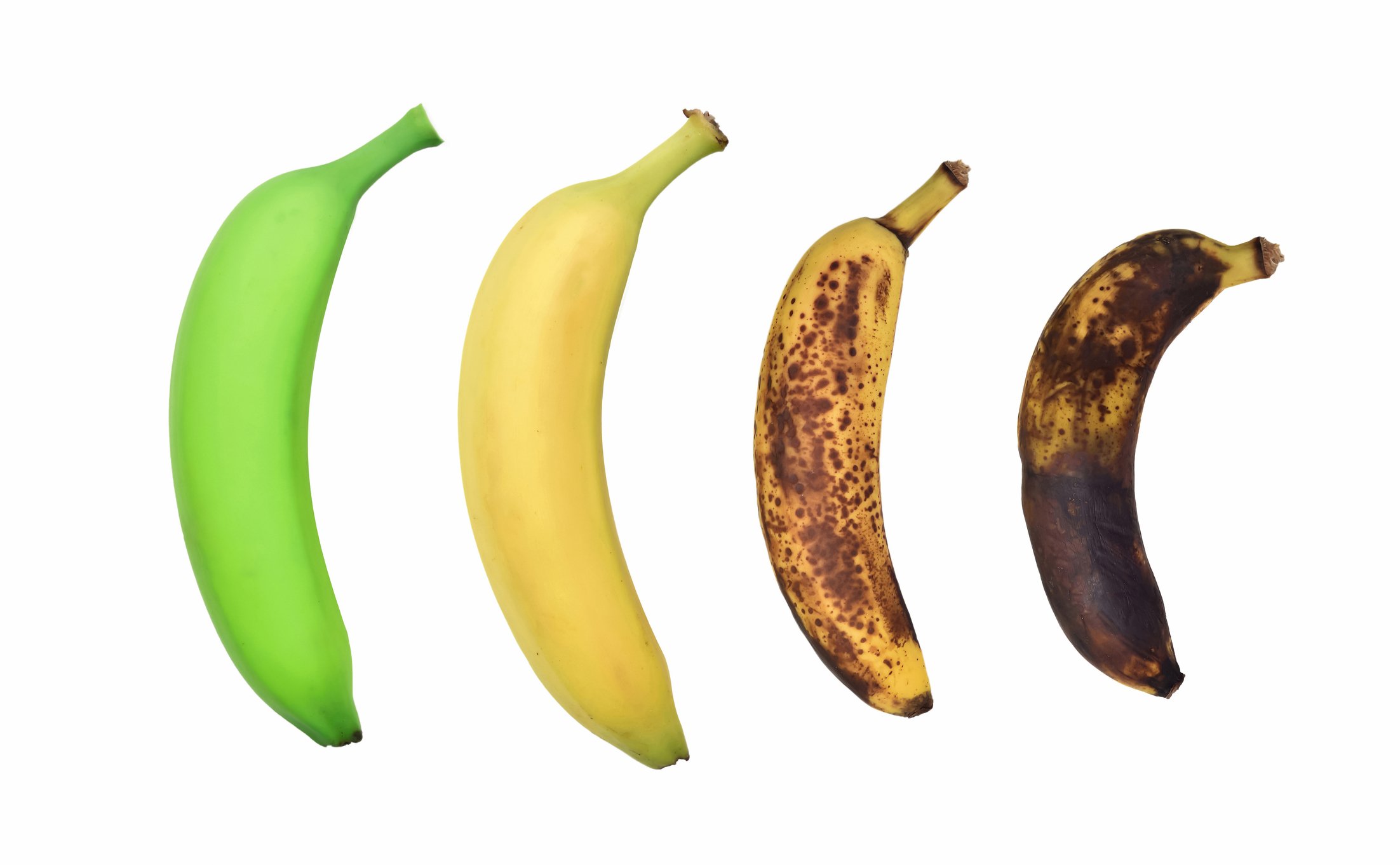 Imagem de banana verde, amarela e madura.