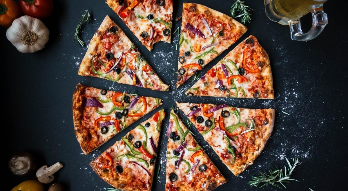 Divulgação - Imagem de pizza fatiada