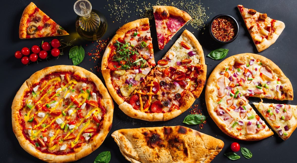 Wirestock/IStock - Imagem de 4 tipos de pizzas