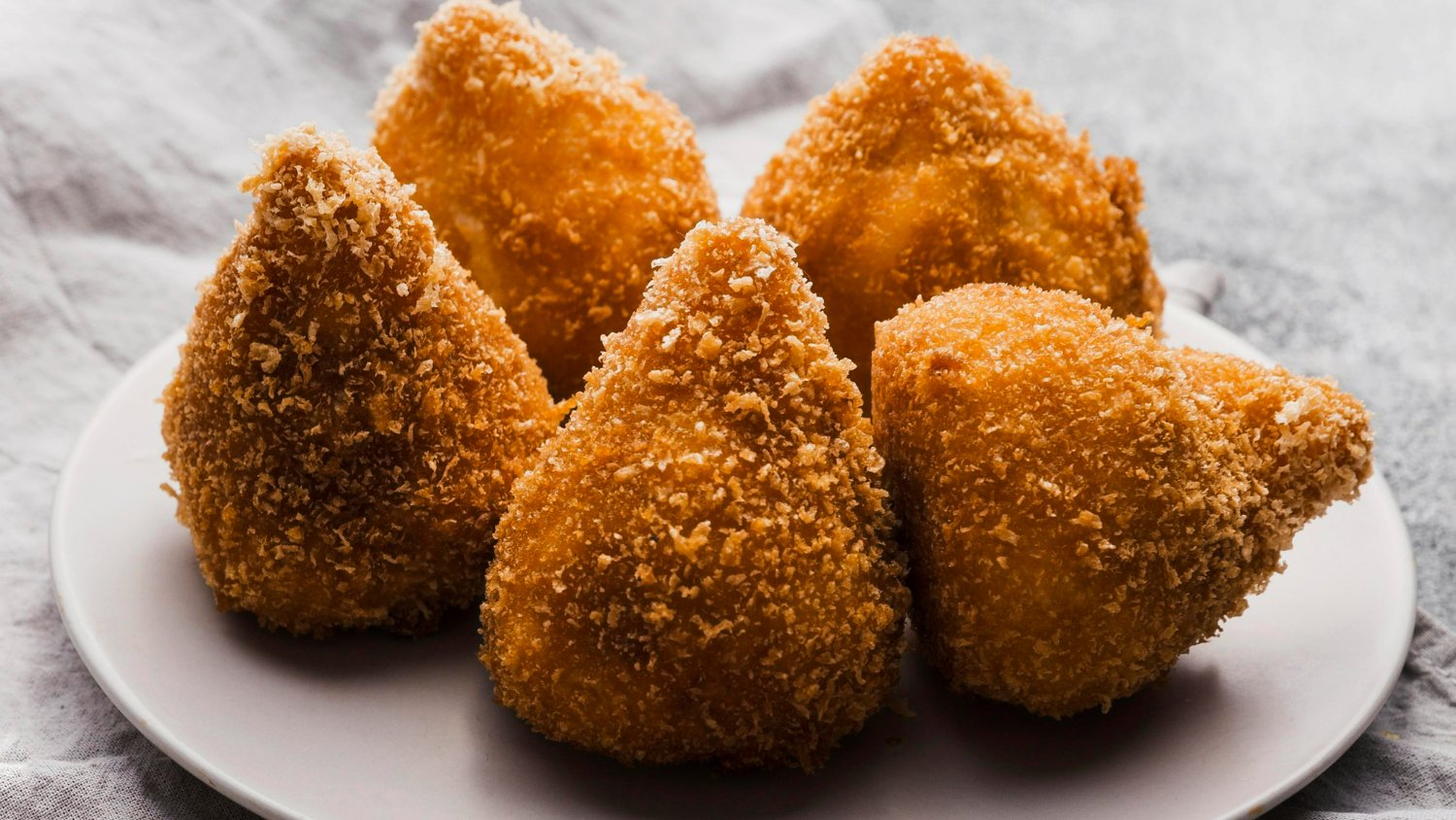 Coxinhas crocantes de peru